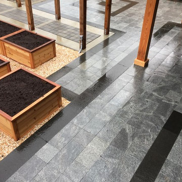 Rain soaked stone patio levels