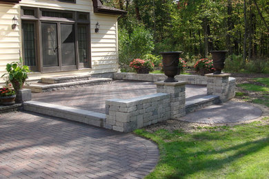 Mid-sized concrete paver patio photo in Indianapolis