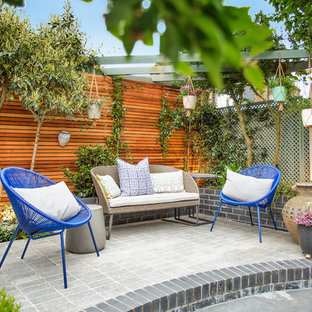 This is an example of a classic patio in London with a potted garden.