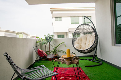 Immagine di un patio o portico minimalista di medie dimensioni