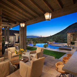 Example of a southwest patio design in Other