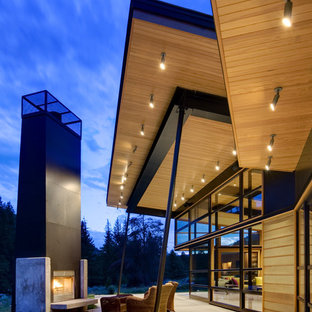 Patio - contemporary patio idea in Seattle with a fire pit