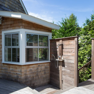 Foto di un patio o portico american style di medie dimensioni e dietro casa con pedane e nessuna copertura