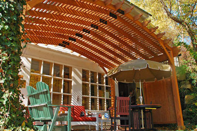 Inspiration for a small backyard patio remodel in Cleveland with a pergola