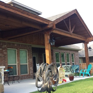 Rockwall - Patio cover with gable and shed and an 8' outdoor kitchen.