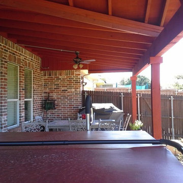 Rockwall - Shingled 13' x 31' patio cover with gable.