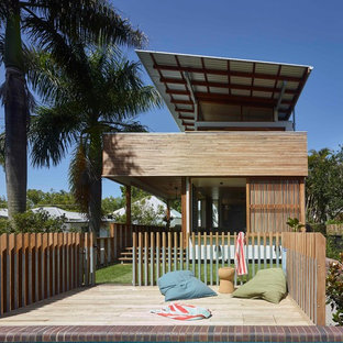 Inspiration for a small contemporary backyard patio in Brisbane with decking and no cover.