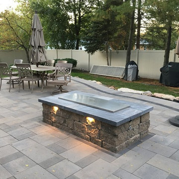 Rose Outdoor Living Space Raised Paver Deck with Natural Gas Fire Pit