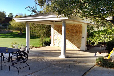 Inspiration for a mid-sized mediterranean backyard concrete paver patio remodel in San Francisco with a gazebo