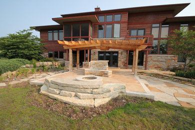 Example of an arts and crafts patio design in Other