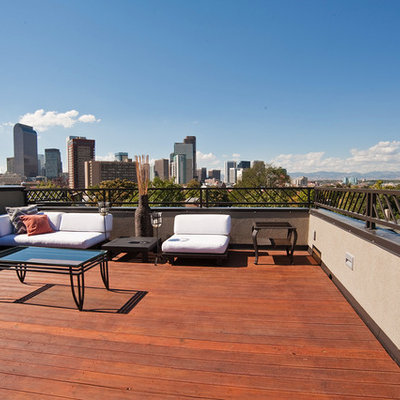 Mid-sized trendy patio photo in Denver with decking and no cover