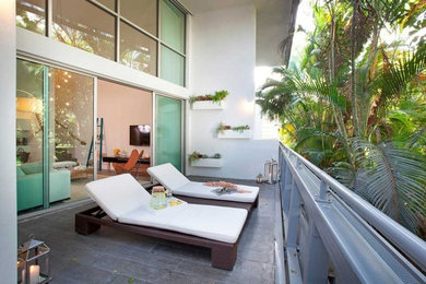 Patio - coastal patio idea in Miami