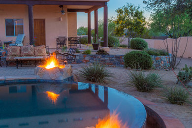 Inspiration for a mid-sized southwestern patio remodel in Phoenix