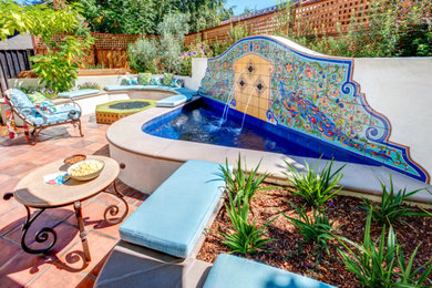 Patio fountain - small backyard tile patio fountain idea in San Luis Obispo