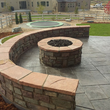 Stamped Concrete Patio & Firepit, In-Ground Trampoline.