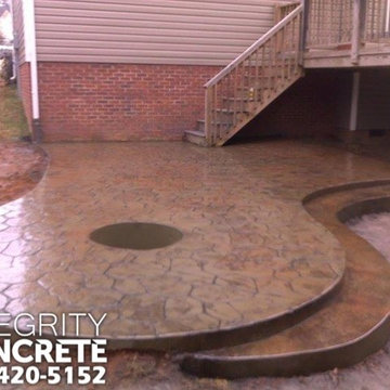 Stamped concrete patio with fire pit