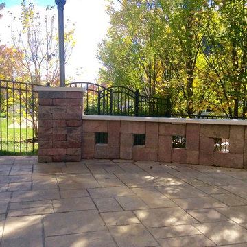 Stamped concrete patio with stamped brick edge.