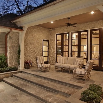 Stone and Cedar Shake come together for this Southern Living Style home