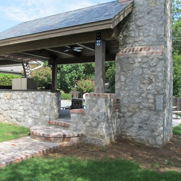Stone Outdoor Kitchen Addition with Fireplace and Hasty-Bake Charcoal Grill