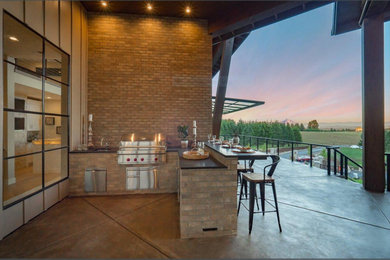 Example of a tuscan patio design in Portland