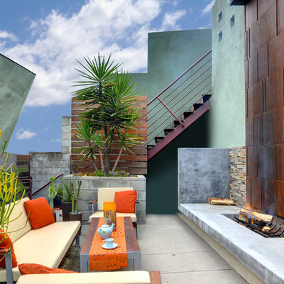 Trendy concrete patio photo in Los Angeles with no cover