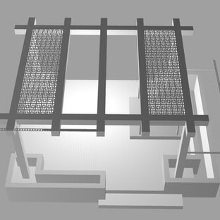 Ispirazione per un patio o portico moderno di medie dimensioni e dietro casa con lastre di cemento e una pergola