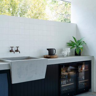 Design ideas for a contemporary patio in Perth with an outdoor kitchen and a roof extension.