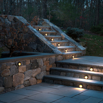 Example of a classic backyard patio design in Boston