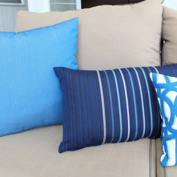 Sunbrella custom throw pillows in shades of blue