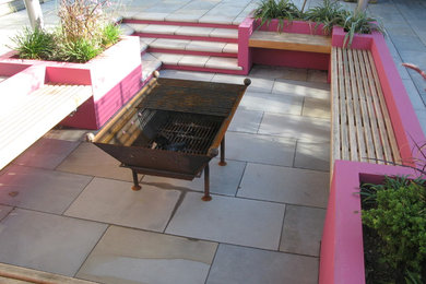 This is an example of a contemporary patio in Kent.