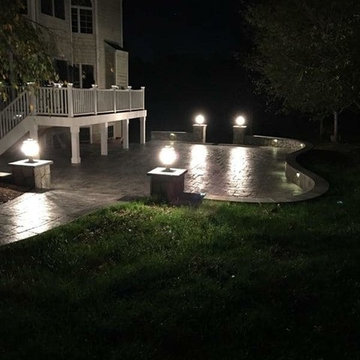 T-Stamped concrete patio, flagstone wall with columns