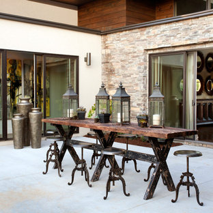 Example of a mountain style patio design in Other with no cover