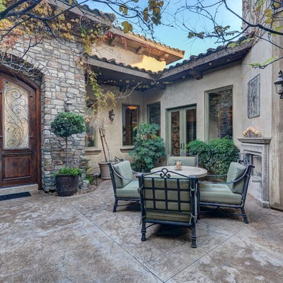 Example of a mid-sized classic concrete patio design in Las Vegas with no cover