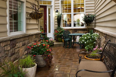 Patio container garden - traditional front yard patio container garden idea in Wilmington with no cover