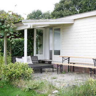 Esempio di un piccolo patio o portico scandinavo