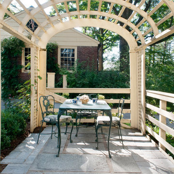 The original pergola is refurbished with a new granite stone floor.