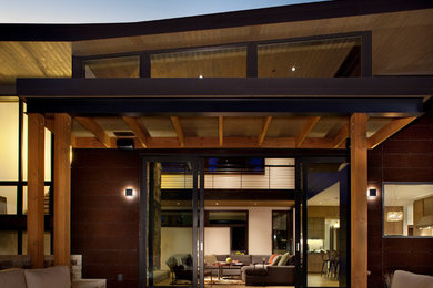 Design ideas for a large contemporary patio in Denver.