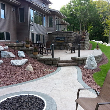 Three Level Outdoor Area with a Deck, Patio and Firepit Area