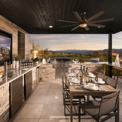 Inspiration for a contemporary backyard patio kitchen remodel in Phoenix