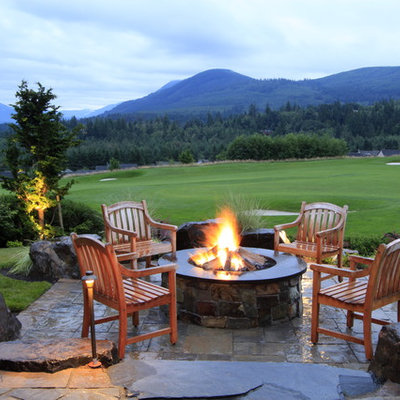 Inspiration for a timeless patio remodel in Seattle with a fire pit