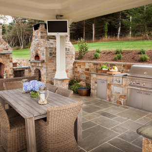 Elegant patio kitchen photo in Other