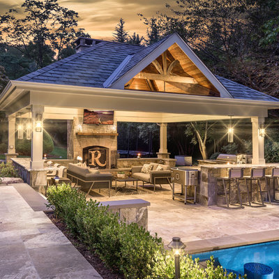 Inspiration for a timeless backyard stone patio remodel in Richmond with a gazebo