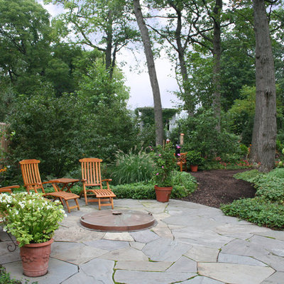 Patio - traditional stone patio idea in Chicago with no cover