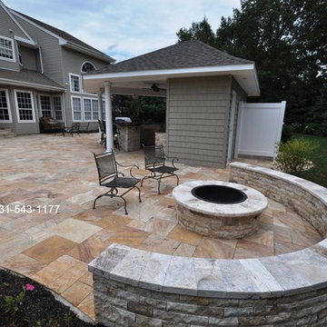 Travertine Fire Pit & Sitting Wall Built by Gappsi on Long Island