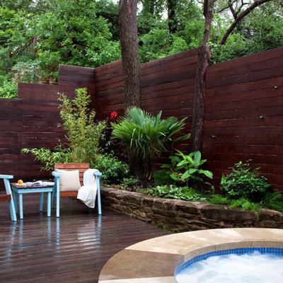 Inspiration for a contemporary patio remodel in Austin with decking and no cover