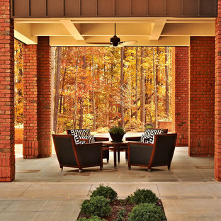 Example of a trendy backyard patio design in Raleigh
