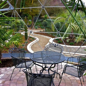 Tropical house and seating area for formal gardens