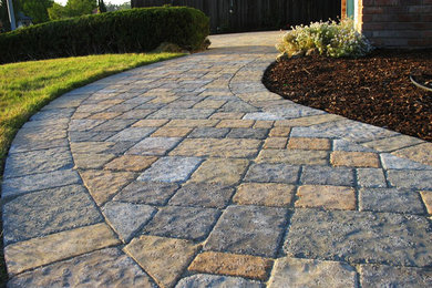 Inspiration for a timeless front yard concrete paver patio remodel in Santa Barbara