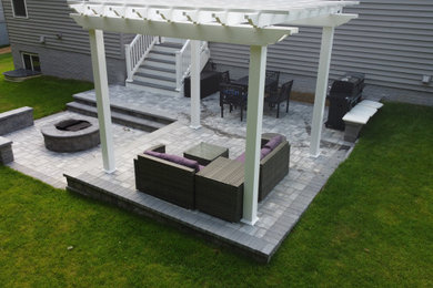 Patio - small backyard concrete paver patio idea in Baltimore