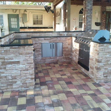 U shaped outdoor kitchen and bar area